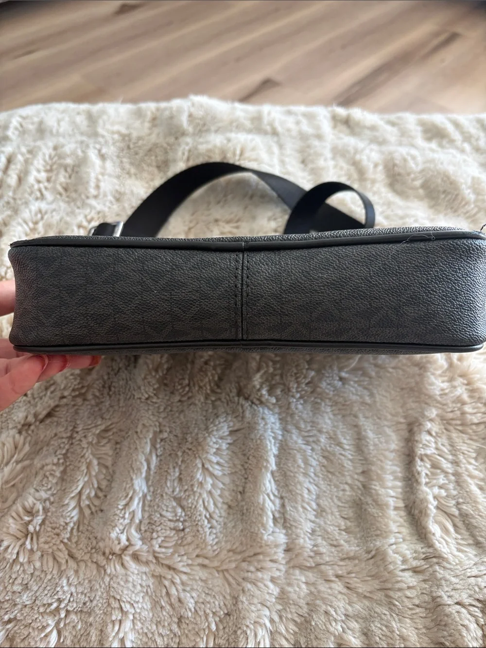 Michael Kors Black Crossbody Bag with Embossed MK Medallion